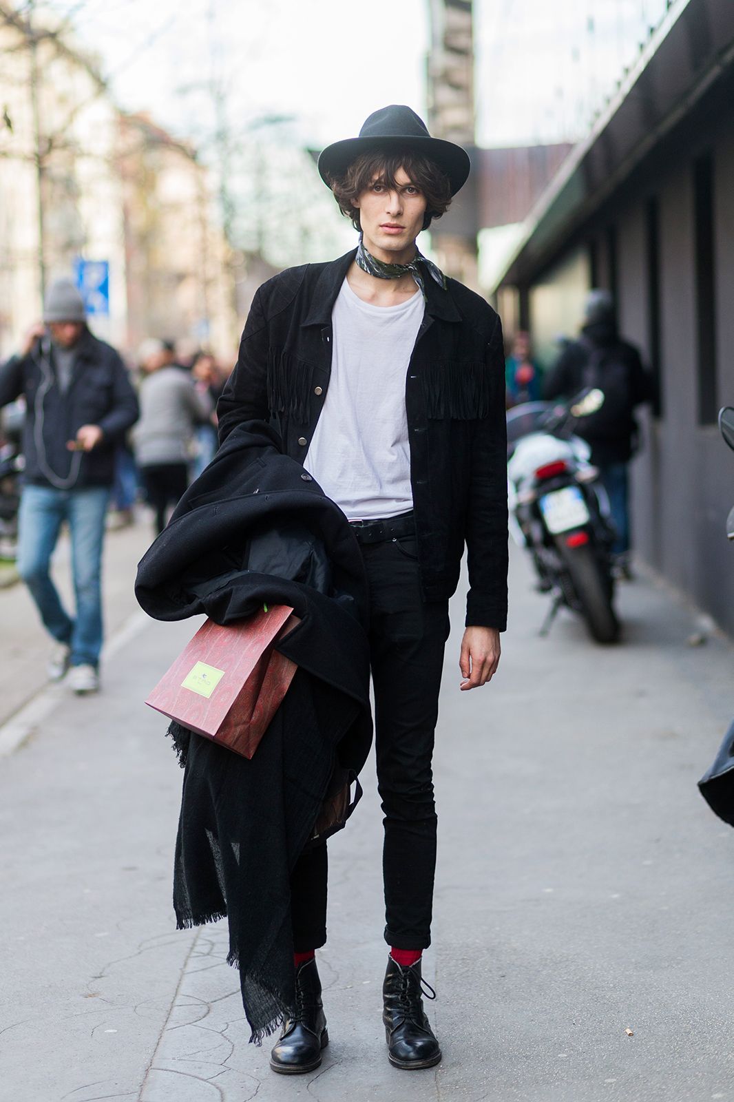 Man wearing dark-coloured trendy clothes